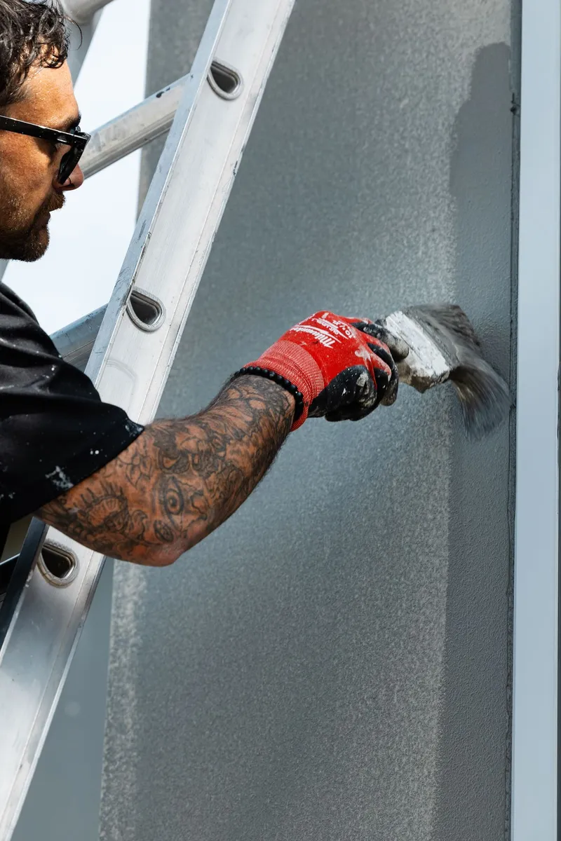 Platinum painter cutting in an edge by hand