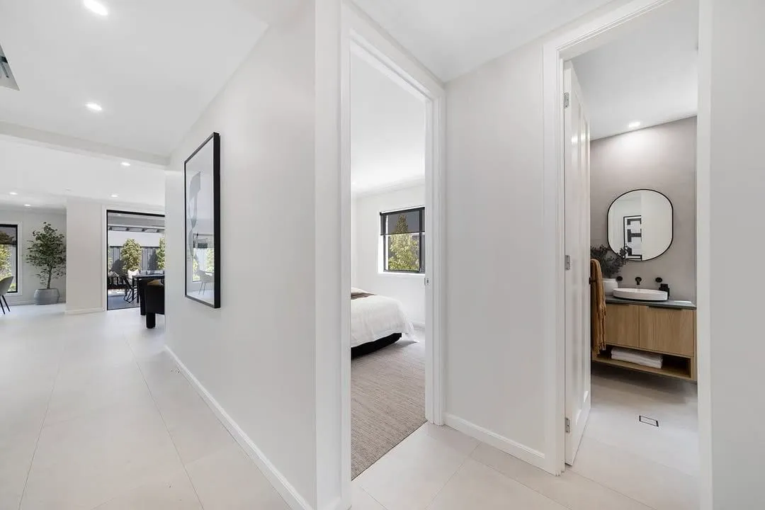 Finished bright white hallway interior painted by Platinum Painting