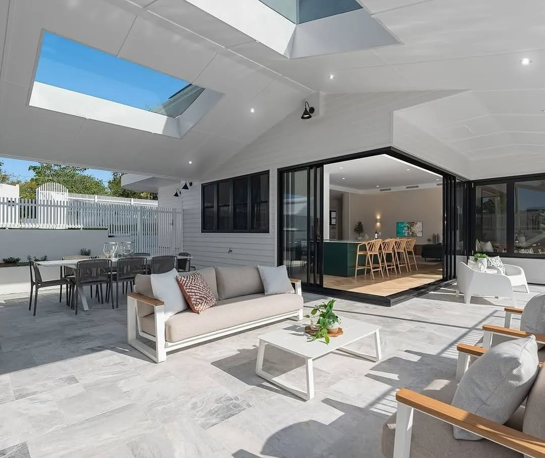Alfresco area with skylights painted bright white