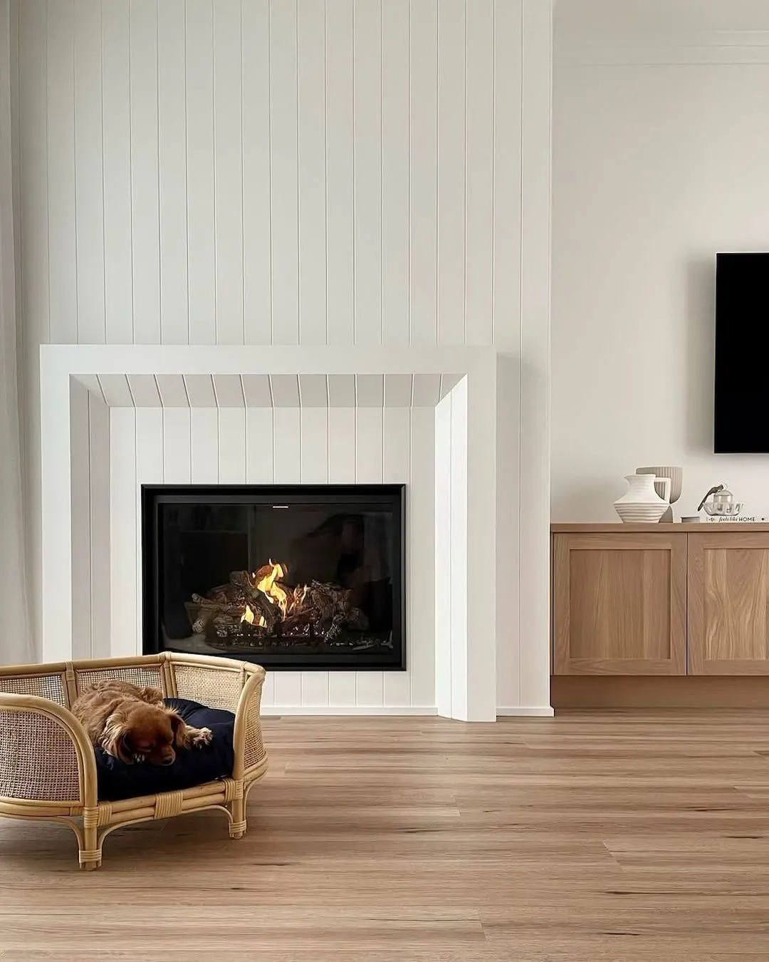 Panelled fireplace wall painted crisp white